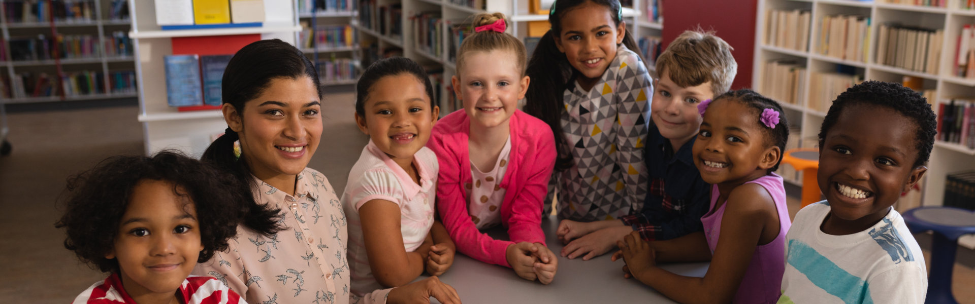 female teacher and schoolkids
